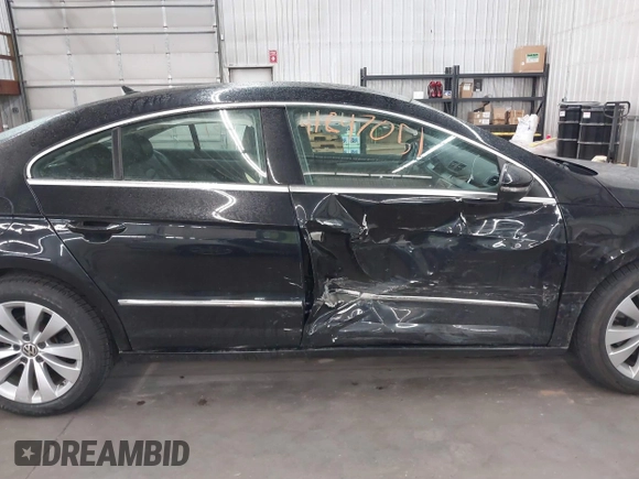 2012 Volkswagen CC Sport PZEV with VIN WVWMP7AN8CE537805, listed as a IAAI auction lot 41847051 with 147,095 mi miles. Bid and sale history available at carsss.com. Image 13.