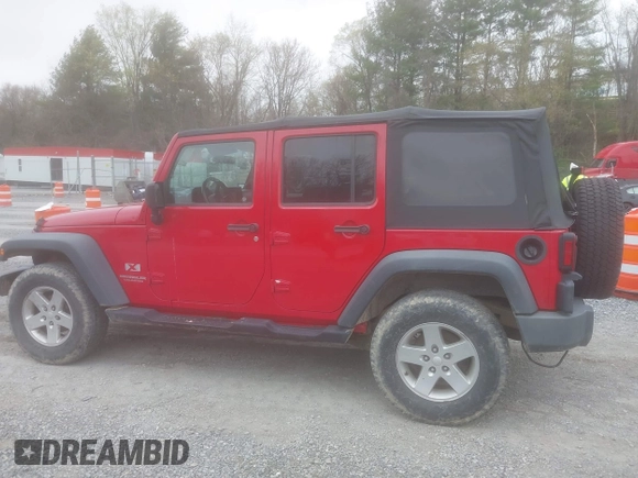 2008 Jeep Wrangler Unlimited X with VIN 1J8GA39128L562347, listed as a IAAI auction lot 41912669 with 106,040 mi miles and . Bid and sale history available at carsss.com. Image 15.