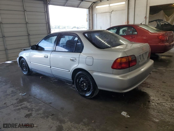 1999 Honda Civic VP with VIN 2HGEJ6617XH594440, listed as a Copart auction lot 70272194 with 200,639 mi miles and Salvage Title. Bid and sale history available at carsss.com. Image 2.