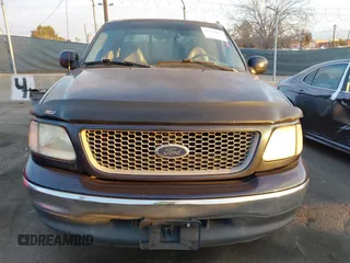 1999 Ford F-150 XL with VIN 1FTRX17L3XKB32547, listed as a IAAI auction lot 41331882 with Not Provided miles. Bid and sale history available at carsss.com. Image 12.
