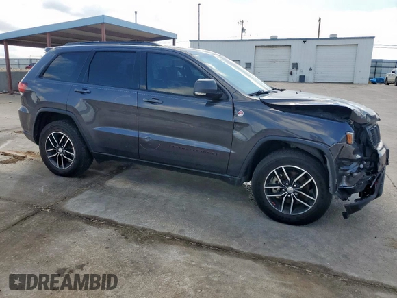 2018 Jeep Grand Cherokee Trailhawk with VIN 1C4RJFLG7JC467934, listed as a Copart auction lot 56193335 with 57,578 mi miles and Salvage title. Bid and sale history available at DreamBid. Image 4.