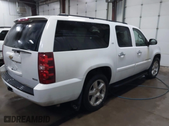 2008 Chevrolet Suburban LT w/3LT with VIN 1GNFK16388J208099, listed as a IAAI auction lot 41710552 with 228,929 mi miles. Bid and sale history available at carsss.com. Image 4.