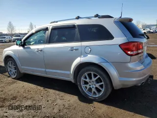 2012 Dodge Journey SXT with VIN 3C4PDCCG7CT135822, listed as a Copart auction lot 48820205 with 253,183 mi miles and Clean title. Bid and sale history available at DreamBid. Image 2.