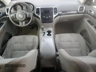 2011 Jeep Grand Cherokee Laredo with VIN 1J4RS4GG6BC704212, listed as a Copart auction lot 83753234 with 200,104 mi miles and Salvage Title. Bid and sale history available at DreamBid. Image 8.