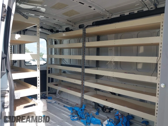 2021 Ford Transit Cargo with VIN 1FTBR1C85MKA19997, listed as a IAAI auction lot 41431285 with 61,158 mi miles and . Bid and sale history available at DreamBid. Image 8.