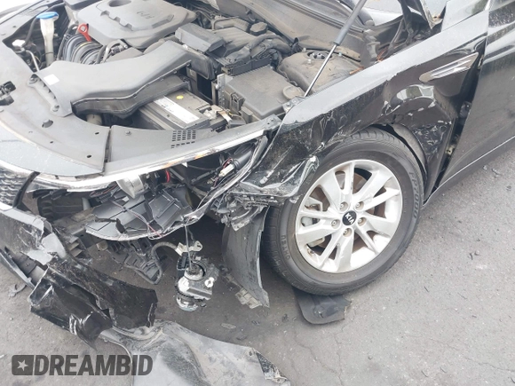 2017 Kia Optima LX z VIN KNAGT4L33H5156094, wystawiony jako IAAI lot #42405505 z przebiegiem 111 622 mil mil oraz . Historia ofert i sprzedaży dostępna na DreamBid. Obrazek 6.