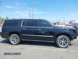 2018 Cadillac Escalade ESV Premium Luxury z VIN 1GYS4JKJ3JR160602, wystawiony jako IAAI lot #42075001 z przebiegiem 100 899 mil mil oraz . Historia ofert i sprzedaży dostępna na DreamBid. Obrazek 14.