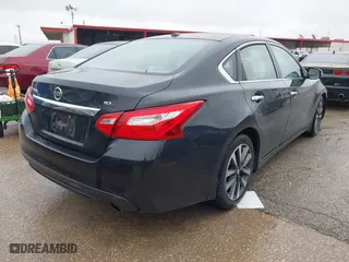2016 Nissan Altima 2.5 SL with VIN 1N4AL3AP9GC269752, listed as a IAAI auction lot 41550006 with 164,240 mi miles. Bid and sale history available at carsss.com. Image 4.