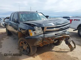2011 Chevrolet Silverado 1500 LT with VIN 1GCRKSE3XBZ126090, listed as a IAAI auction lot 41861969 with 185,344 mi miles and . Bid and sale history available at DreamBid. Image 1.