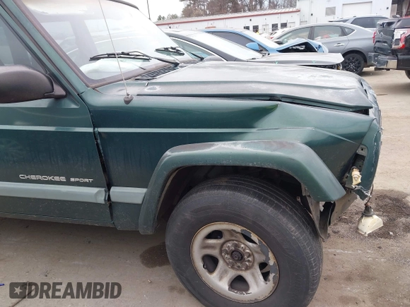 2000 Jeep Cherokee with VIN 1J4FT48S6YL102373, listed as a IAAI auction lot 41685817 with 214,106 mi miles and . Bid and sale history available at DreamBid. Image 13.