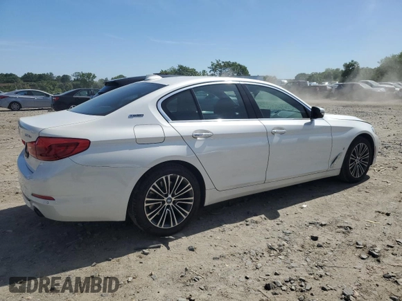 2018 BMW 5 Series 530e xDrive with VIN WBAJB1C51JG624259, listed as a Copart auction lot 57161285 with 133,463 mi miles and Clean title. Bid and sale history available at DreamBid. Image 3.
