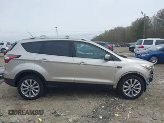 2017 Ford Escape Titanium with VIN 1FMCU0JD2HUC30884, listed as a IAAI auction lot 41801272 with 111,644 mi miles. Bid and sale history available at carsss.com. Image 14.