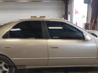 1999 Toyota Camry LE с VIN JT2BG22K7X0351800, выставлен на аукционе IAAI как лот 42216413 с пробегом 216 330 миль миль и . История ставок и продаж доступна на DreamBid. Изображение 13.
