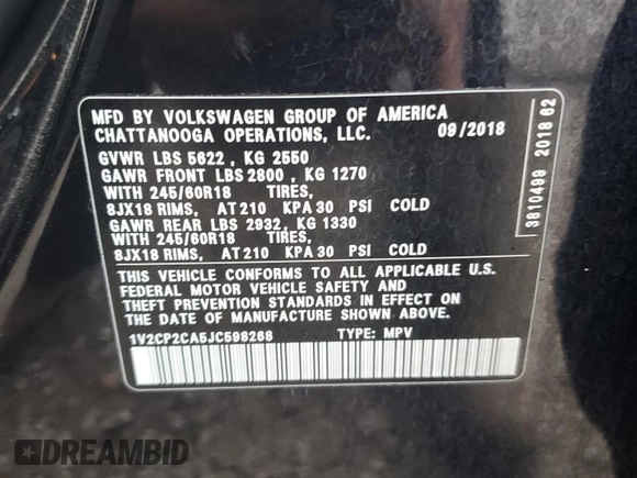 2018 Volkswagen Atlas SE with VIN 1V2CP2CA5JC598268, listed as a Copart auction lot 82860014 with 102,341 mi miles and Salvage title. Bid and sale history available at DreamBid. Image 14.
