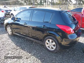 2009 Nissan Versa 1.8 SL with VIN 3N1BC13E59L406937, listed as a IAAI auction lot 41387158 with 149,234 mi miles. Bid and sale history available at carsss.com. Image 14.