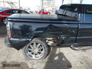 2003 Chevrolet Silverado 1500 LS with VIN 1GCEK19T53E131290, listed as a IAAI auction lot 41414921 with 191,890 mi miles. Bid and sale history available at carsss.com. Image 6.