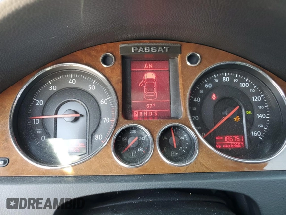 2007 Volkswagen Passat 2.0T with VIN WVWEK73CX7E169647, listed as a Copart auction lot 52989515 with 186,751 mi miles and Salvage title. Bid and sale history available at DreamBid. Image 9.