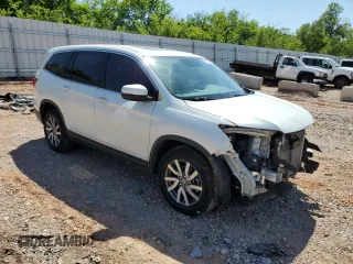 2021 Honda Pilot EX-L with VIN 5FNYF6H52MB096077, listed as a Copart auction lot 56970435 with 59,749 mi miles and Salvage title. Bid and sale history available at DreamBid. Image 4.