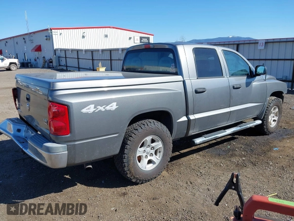 2005 Dodge Dakota SLT with VIN 1D7HW48N25S133725, listed as a IAAI auction lot 42074588 with 163,090 mi miles. Bid and sale history available at carsss.com. Image 4.