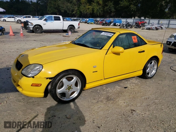 1999 Mercedes-Benz SLK-Class with VIN WDBKK47F9XF076441, listed as a Copart auction lot 73745154 with 104,481 mi miles and Salvage Title. Bid and sale history available at carsss.com. Image 1.
