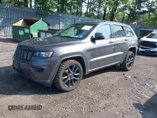 2017 Jeep Grand Cherokee Altitude with VIN 1C4RJFAG4HC807439, listed as a IAAI auction lot 42468652 with 149,807 mi miles and . Bid and sale history available at DreamBid. Image 2.