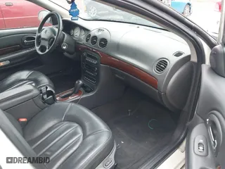 2000 Chrysler LHS with VIN 2C3HC56G4YH382301, listed as a IAAI auction lot 41324699 with 220,076 mi miles. Bid and sale history available at carsss.com. Image 5.