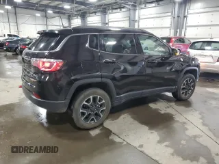 2019 Jeep Compass Trailhawk with VIN 3C4NJDDB4KT647187, listed as a Copart auction lot 50260575 with 63,098 mi miles and Salvage Title. Bid and sale history available at carsss.com. Image 3.