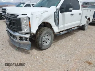 2023 Ford F-250 XL with VIN 1FT7W2BA1PEC14278, listed as a IAAI auction lot 42410942 with 61,769 mi miles and . Bid and sale history available at DreamBid. Image 2.