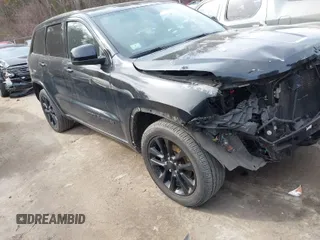2018 Jeep Grand Cherokee Laredo E with VIN 1C4RJFAG2JC280670, listed as a IAAI auction lot 41686231 with 84,511 mi miles. Bid and sale history available at carsss.com. Image 1.