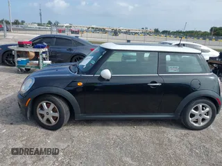 2010 MINI Hardtop with VIN WMWMF3C5XATU77265, listed as a IAAI auction lot 42007797 with 28,856 mi miles and . Bid and sale history available at DreamBid. Image 14.