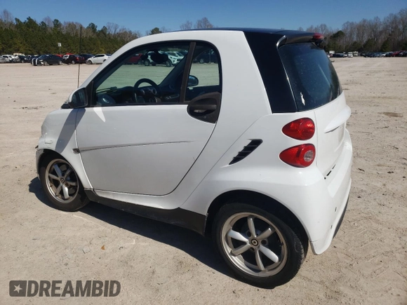 2014 Smart fortwo Pure с VIN WMEEJ3BA0EK780282, выставлен на аукционе Copart как лот 47691815 с пробегом 74 144 миль миль и Чистый • Clean title. История ставок и продаж доступна на DreamBid. Изображение 2.