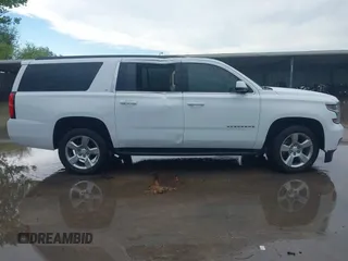 2018 Chevrolet Suburban LT with VIN 1GNSCHKC2JR376239, listed as a IAAI auction lot 42110551 with 123,694 mi miles and . Bid and sale history available at DreamBid. Image 13.