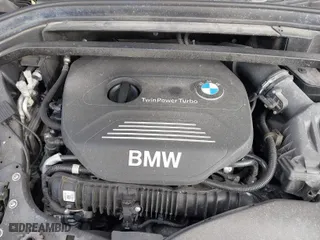 2017 BMW X1 xDrive28i with VIN WBXHT3C38H5F70947, listed as a IAAI auction lot 41652626 with 76,843 mi miles. Bid and sale history available at carsss.com. Image 10.