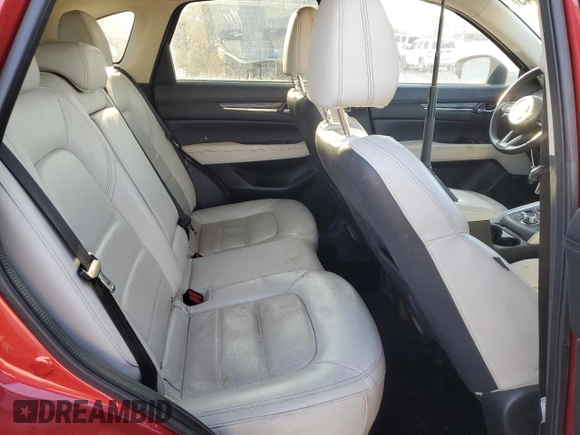 2018 Mazda CX-5 Grand Touring z VIN JM3KFBDMXJ0390680, wystawiony jako Copart lot #51654345 z przebiegiem 67 167 mil mil oraz Szkoda całkowita • Salvage title. Historia ofert i sprzedaży dostępna na DreamBid. Obrazek 11.