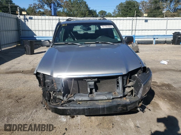 2002 GMC Envoy SLT with VIN 1GKDS13SX22301062, listed as a Copart auction lot 81791024 with 0 mi miles and Salvage Title. Bid and sale history available at carsss.com. Image 5.