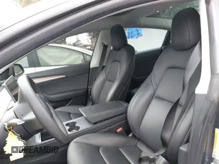 2023 Tesla Model 3 z VIN 5YJ3E1EAXPF403095, wystawiony jako IAAI lot #42151764 z przebiegiem 17 872 mil mil oraz . Historia ofert i sprzedaży dostępna na DreamBid. Obrazek 21.