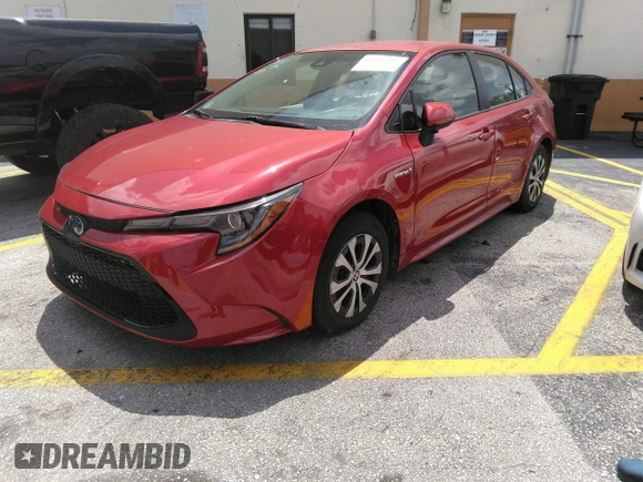 2021 Toyota Corolla Hybrid LE with VIN JTDEAMDE5MJ012662, listed as a IAAI auction lot 41421205 with 138,533 mi miles. Bid and sale history available at carsss.com. Image 2.