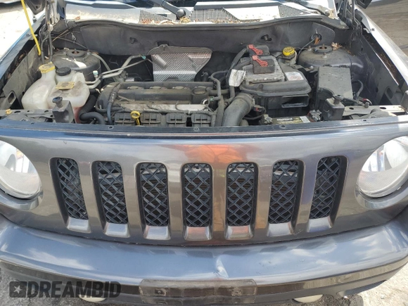 2014 Jeep Patriot Altitude z VIN 1C4NJPBA7ED894466, wystawiony jako Copart lot #54675025 z przebiegiem 110 716 mil mil oraz Szkoda całkowita • Salvage title. Historia ofert i sprzedaży dostępna na DreamBid. Obrazek 11.