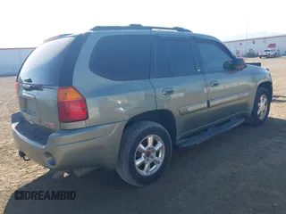 2003 GMC Envoy SLT with VIN 1GKDT13S932373739, listed as a IAAI auction lot 42122017 with 155,963 mi miles. Bid and sale history available at carsss.com. Image 4.