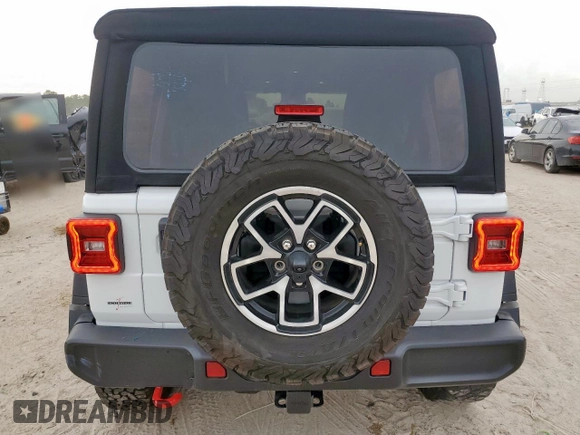 2024 Jeep Wrangler Rubicon with VIN 1C4PJXFG2RW266901, listed as a Copart auction lot 60641445 with 3,908 mi miles and Salvage title. Bid and sale history available at DreamBid. Image 6.
