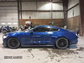 2015 Ford Mustang GT with VIN 1FA6P8CF1F5379452, listed as a IAAI auction lot 41355235 with 128,257 mi miles and . Bid and sale history available at DreamBid. Image 14.
