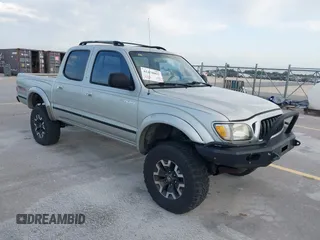 2002 Toyota Tacoma PreRunner z VIN 5TEGN92N22Z097587, wystawiony jako IAAI lot #42470065 z przebiegiem 232 108 mil mil oraz . Historia ofert i sprzedaży dostępna na DreamBid. Obrazek 1.