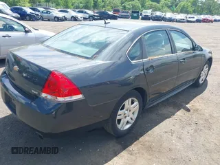 2015 Chevrolet Impala LT with VIN 2G1WB5E32F1147463, listed as a IAAI auction lot 42306010 with 87,941 mi miles and . Bid and sale history available at DreamBid. Image 6.