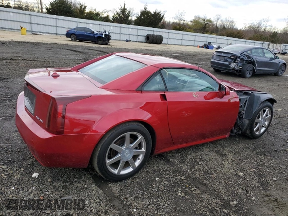 2004 Cadillac XLR z VIN 1G6YV34A845603928, wystawiony jako Copart lot #79260073 z przebiegiem 51 336 mil mil oraz Szkody całkowita. Historia ofert i sprzedaży dostępna na DreamBid. Obrazek 3.
