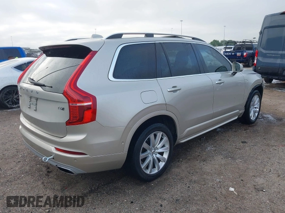 2016 Volvo XC90 T6 Momentum with VIN YV4A22PK7G1078794, listed as a IAAI auction lot 41874698 with 120,256 mi miles. Bid and sale history available at carsss.com. Image 4.