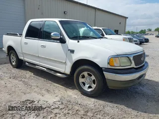 2002 Ford F-150 XLT with VIN 1FTRW07682KD16706, listed as a IAAI auction lot 42038270 with 1 mi miles. Bid and sale history available at carsss.com. Image 1.
