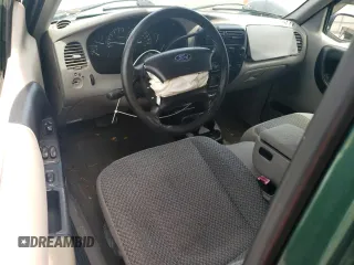 1999 Ford Ranger XLT with VIN 1FTYR14X7XPB63588, listed as a Copart auction lot 56425974 with 183,260 mi miles and Salvage Title. Bid and sale history available at DreamBid. Image 8.