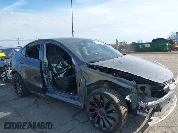 2023 Tesla Model Y Performance with VIN 7SAYGDEF7PF590750, listed as a IAAI auction lot 41694002 with Not Provided miles and . Bid and sale history available at DreamBid. Image 19.