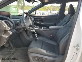 2023 Toyota bZ4X XLE with VIN JTMABACA5PA026008, listed as a Copart auction lot 67336184 with 15,061 mi miles and Salvage Title. Bid and sale history available at carsss.com. Image 7.