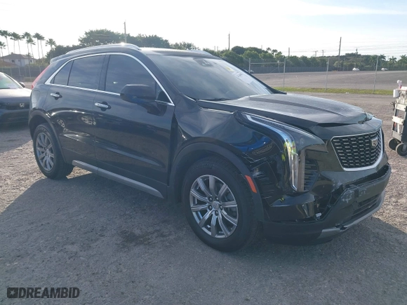 2020 Cadillac XT4 FWD Premium Luxury with VIN 1GYFZCR44LF070832, listed as a IAAI auction lot 41249608 with 77,471 mi miles. Bid and sale history available at carsss.com. Image 1.